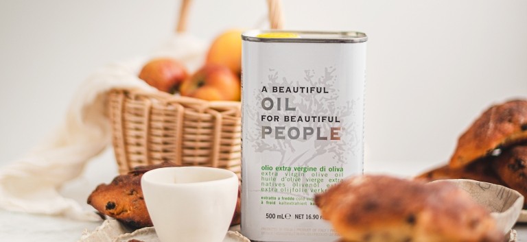 ambient photograph A Beautiful Oil for Beautiful People extra virgin olive oil in white tin can